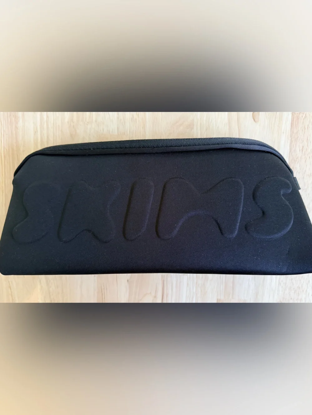 SKIMS Black Neoprene Toiletry Pouch with Raised Logo
